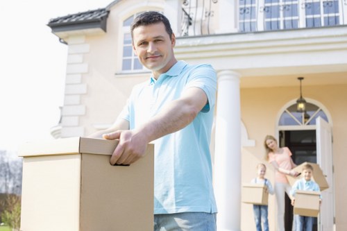 Expert movers handling delicate items with care