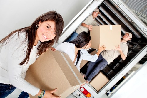 Man with van handling boxes and furniture