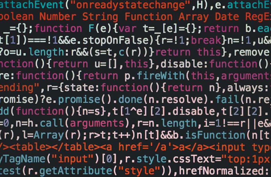 Close-up photograph of a computer screen displaying website code with multiple lines of HTML markup in various colors including pink, green, blue, and yellow. The code includes tags such as <div>, <sp
